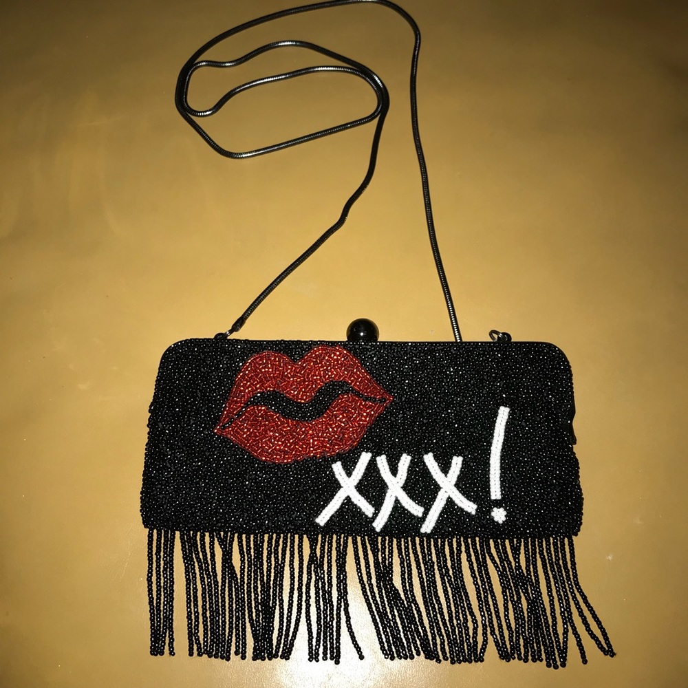 Nicole Miller beaded clutch purse